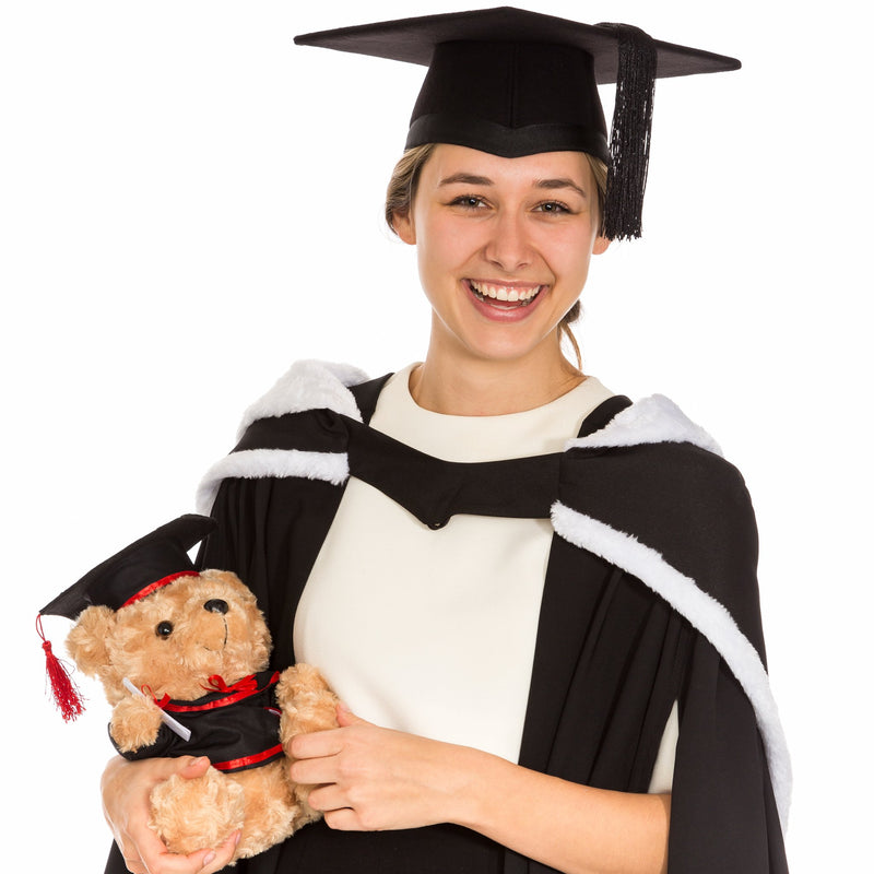 Woman holding a soft graduation bear