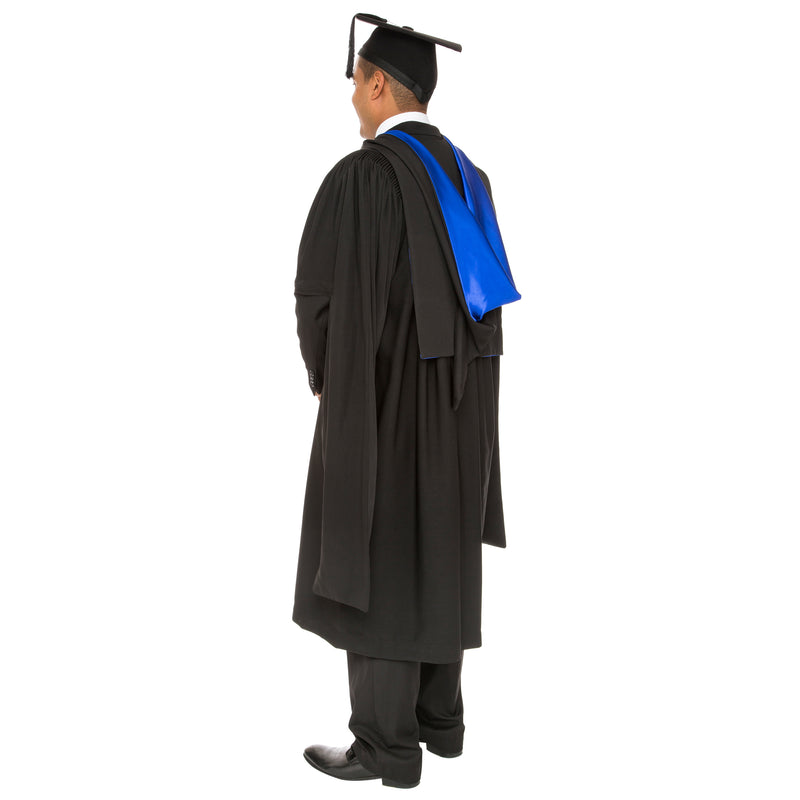 Man wearing a UQ masters graduation hood and graduation gown