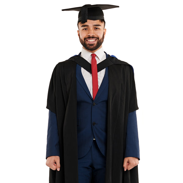 Man wearing a UTS master's graduation set with masters graduation gown and black mortarboard 