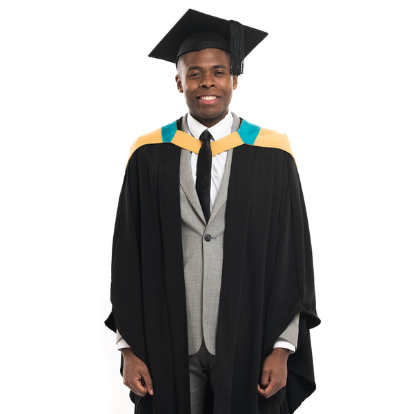 Man wearing a Macquarie University graduation gown, hood and graduation hat 