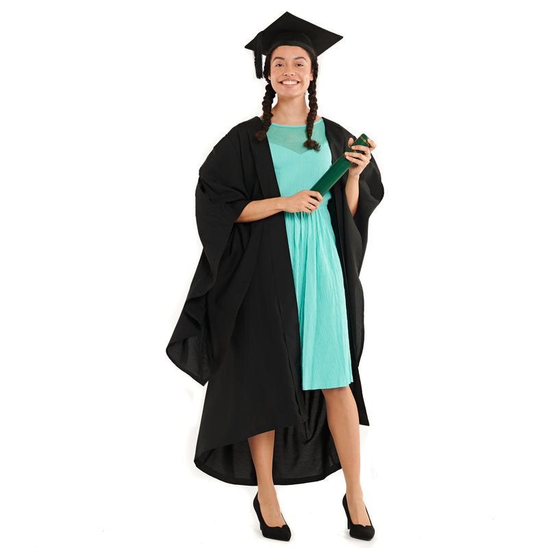 Woman wearing a black academic gown and a black graduation hat