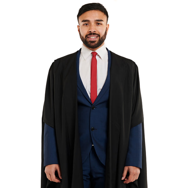 Man wearing a Masters graduation gown
