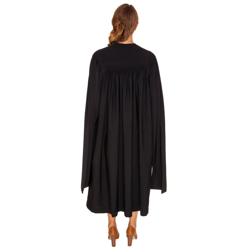 Woman wearing a PhD graduation gown from behind