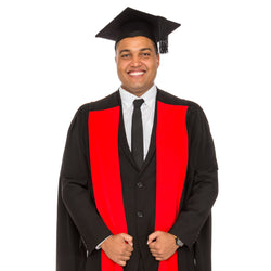 Man wearing a red and black phd gown and a black graduation cap