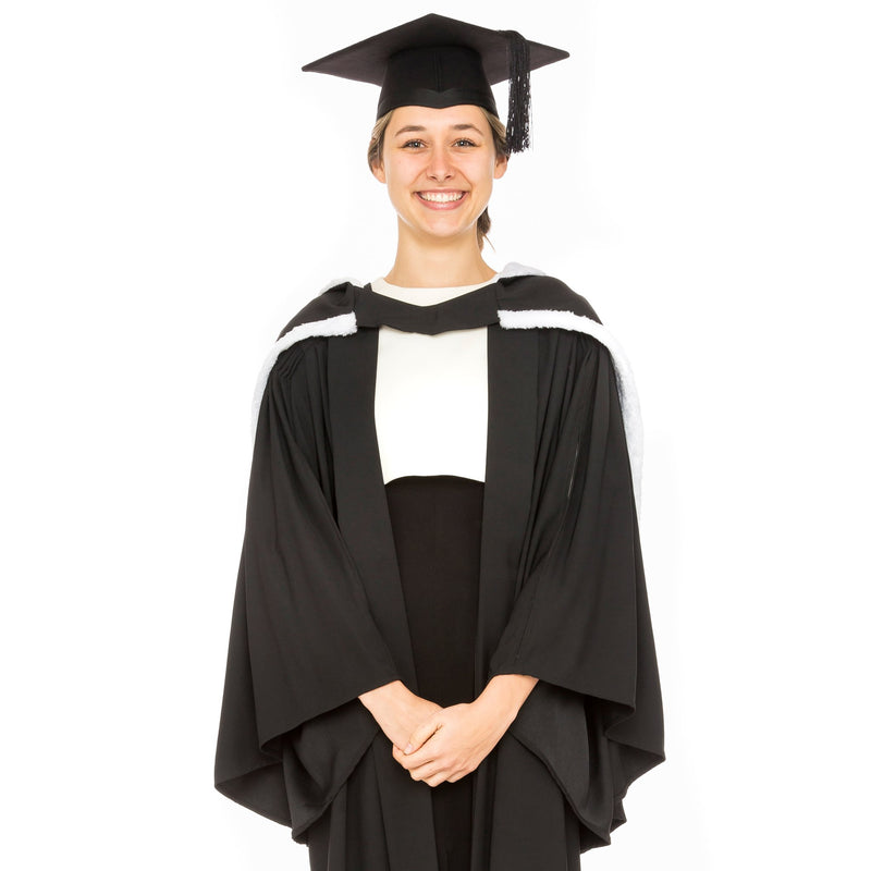 Woman wearing a USYD bachelor of arts graduation gown, hood and graduation hat