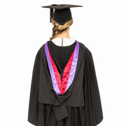 Woman wearing a bachelor hood from the University of Sydney
