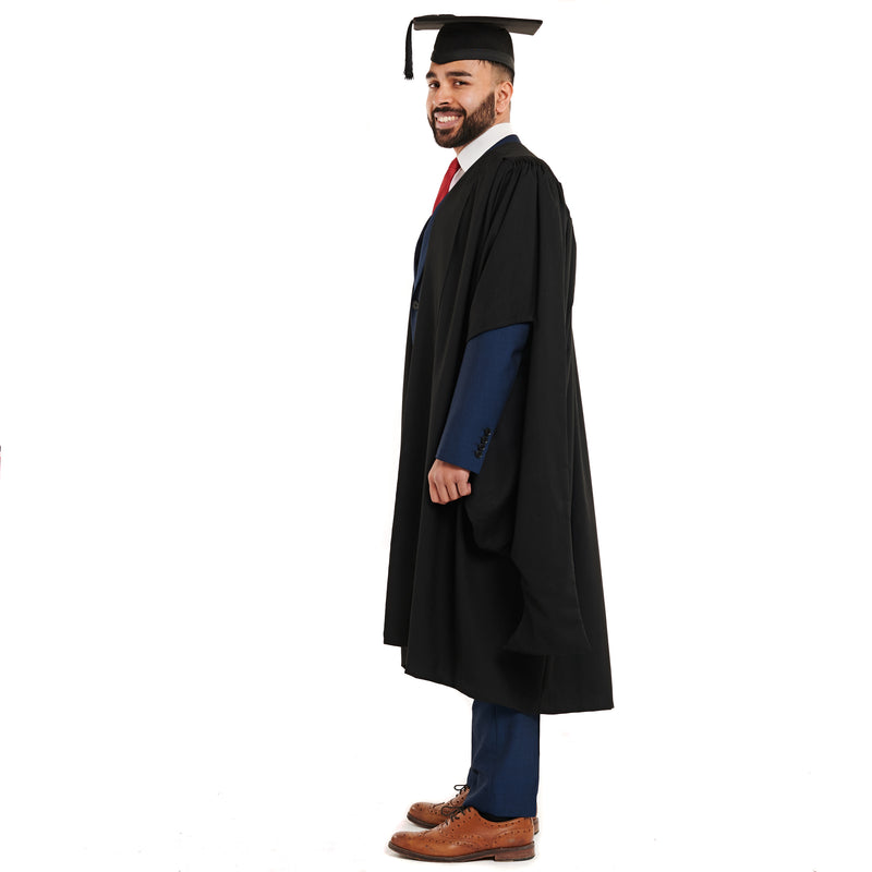 Man wearing a masters graduation outfit