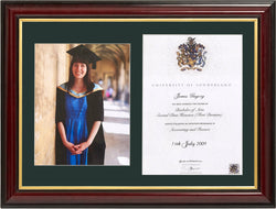 Traditional graduation degree and photo frame with green background 